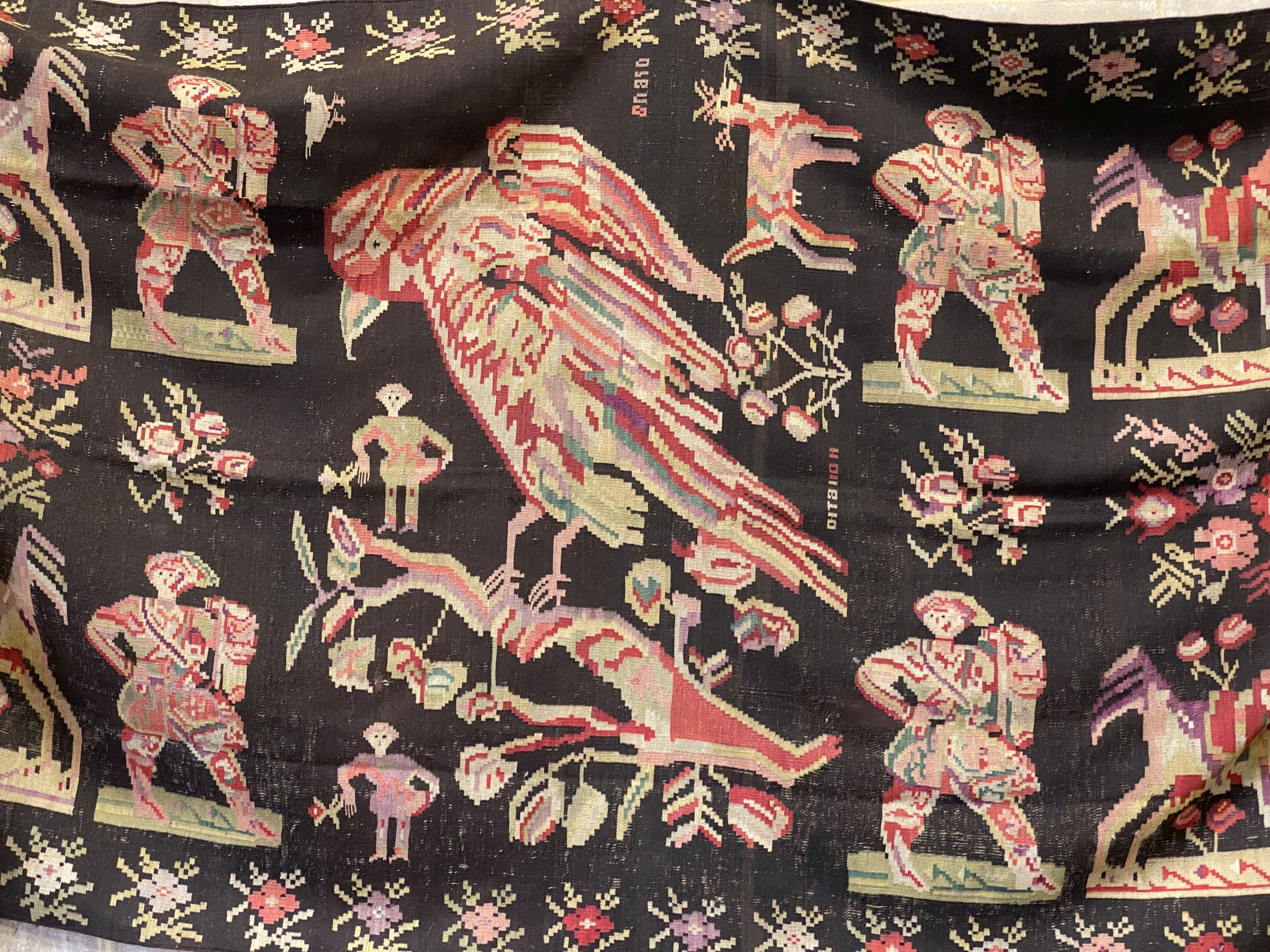 An antique Besbarabiam Kelim flatweave carpet woven with figures and birds, approx. 350 x 170cm